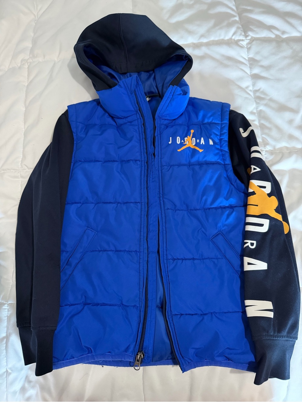 Jordan Blue and Black Puffer Vest Hoodie with Sleeve Logo